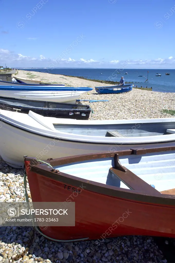 Boats on pebble beach, Selsey, England
