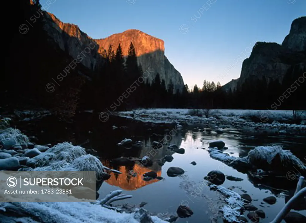 Thick frost beside the Merced River looking towards El Capitan at dusk, Yosemite National Park, California