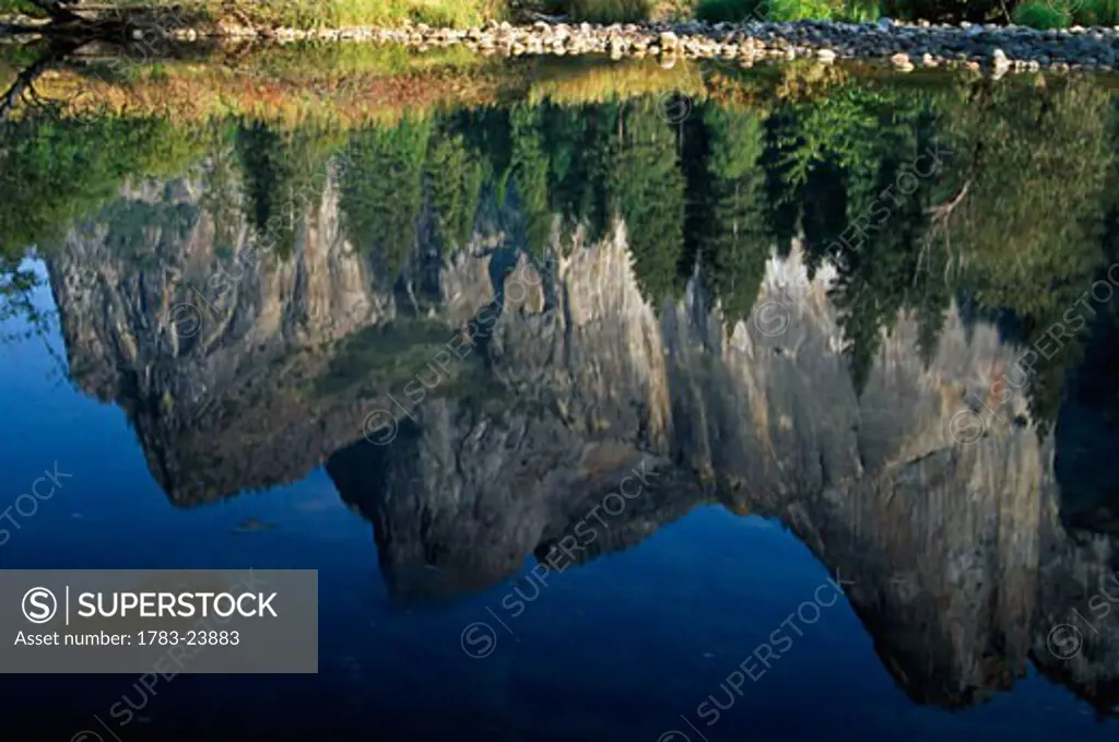 Reflections in Mered River, Yosemite Valley, California, USA.