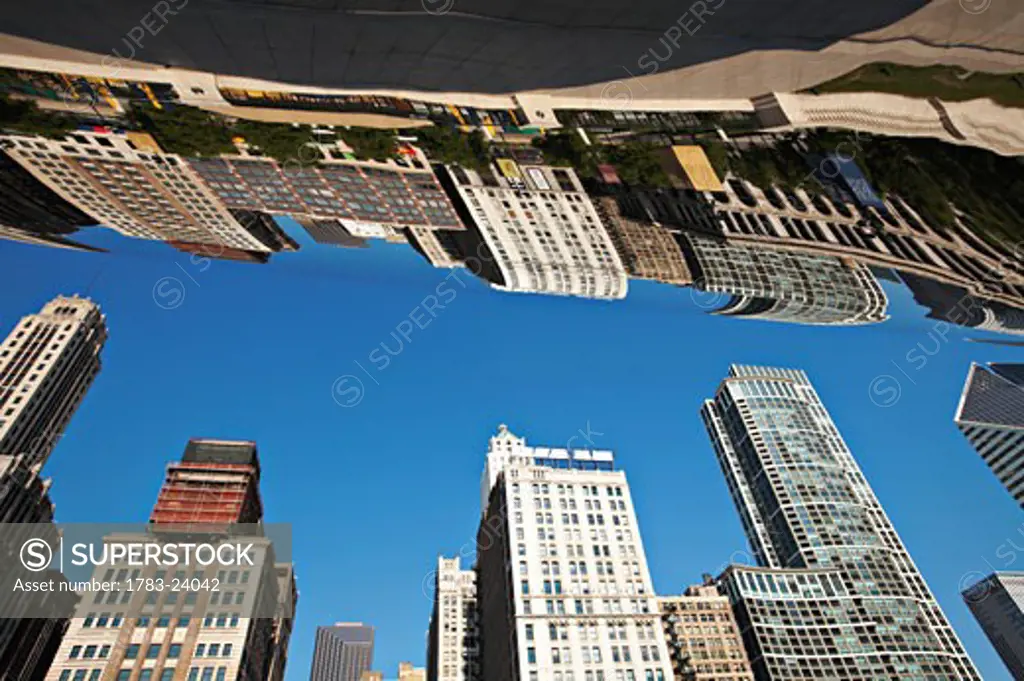 Downtown buildings reflecting in 'Cloud Gate' (The Bean) sculpture, Milleniuim Park, Chicago, Illinois, USA.