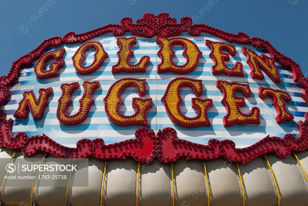 Sign for amusement arcades, Golden Nugget, on the seafront of Great Yarmouth, Norfolk, England, United Kingdom