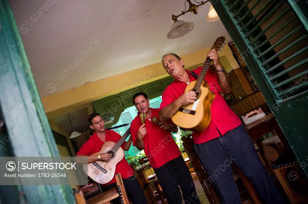 Musicians playing in Bar Riley, Havana, Cuba