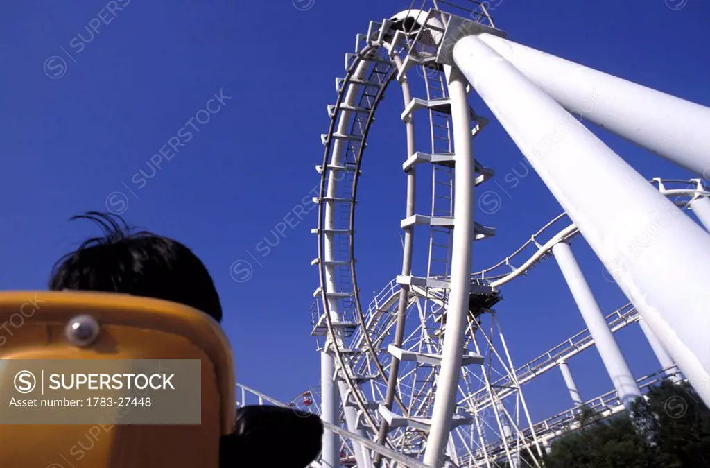 Person riding a rollercoaster