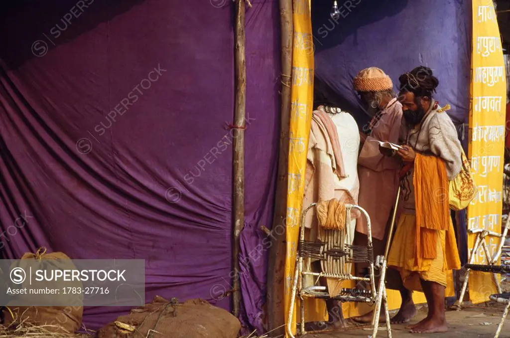 Sadhus shopping during Kumbh Mela., Allahabad, Uttar Pradesh, India