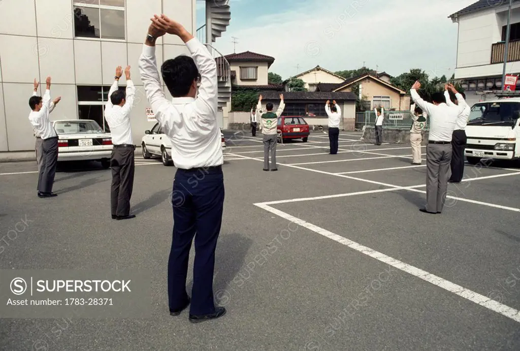 Workers beginning the day by exercising, Japan