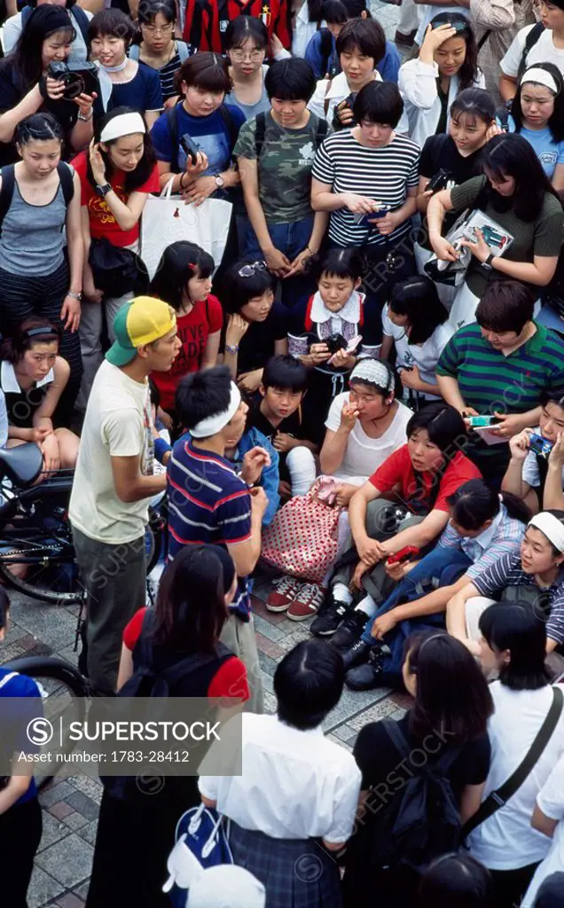 Performers and onlookers at show, Tokyo, Japan