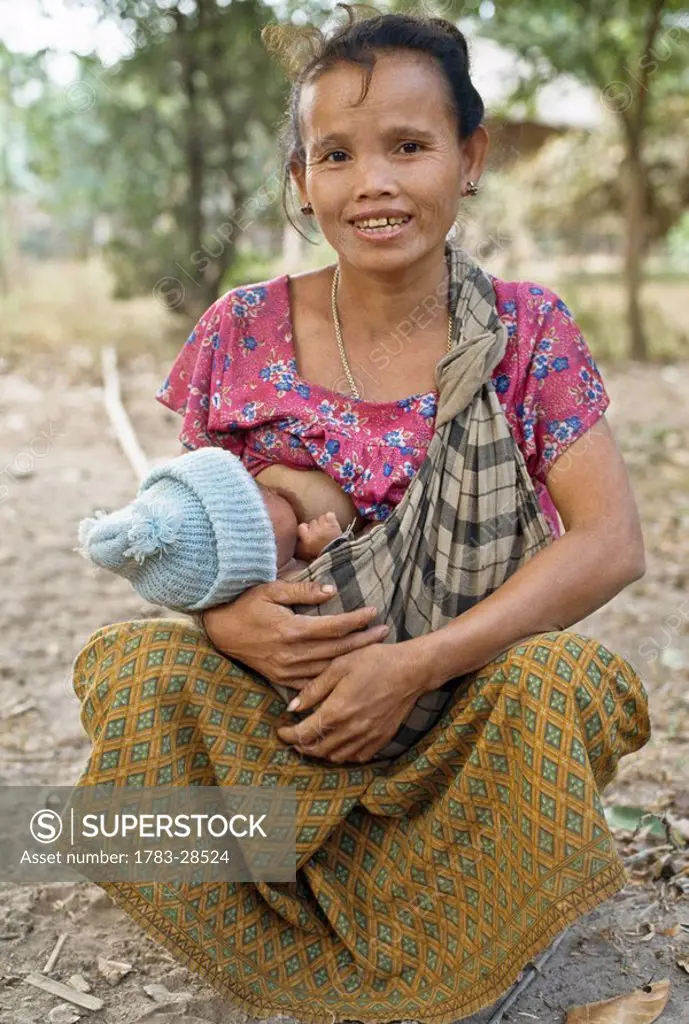 Mother breastfeeding, Savannakhet, Laos