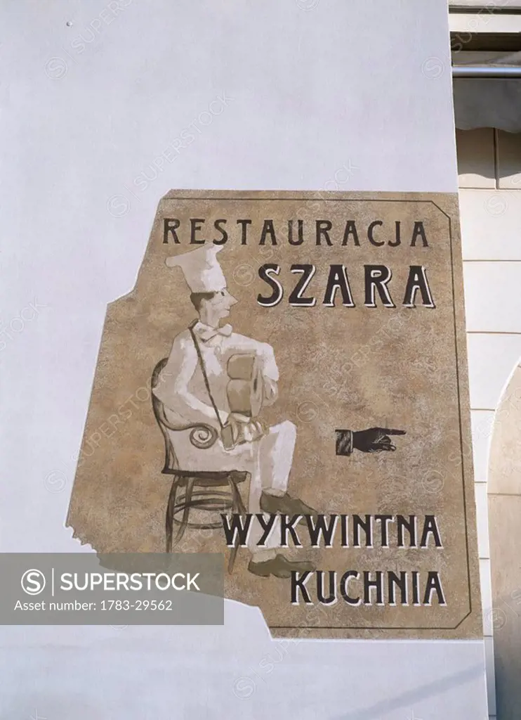 Restaurant sign in Market Square, The Old Quarter, Cracow, Krakow, Kracow, Poland