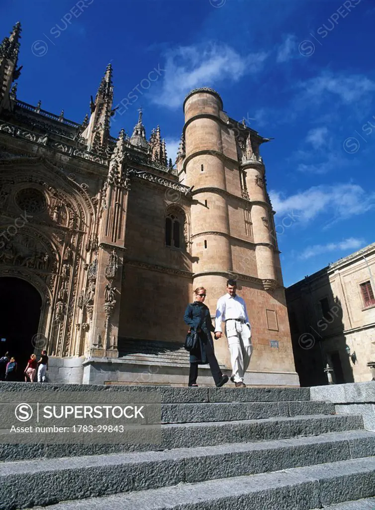 People on steps ofNew Cathedral, Salamanca, Spain
