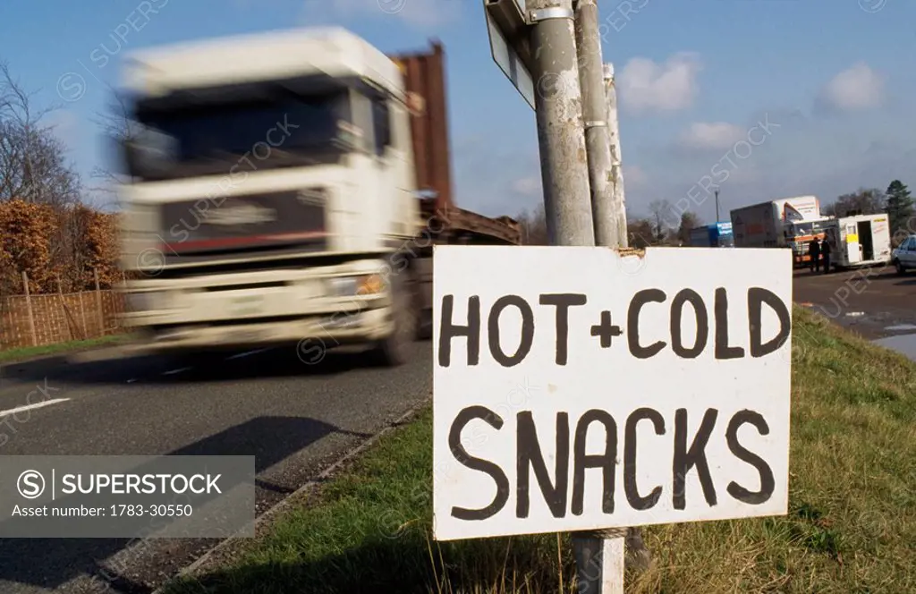 Hot and cold snacks, lay_by, motorway services sign, A40 near Gloucester, Gloucestershire, Engand, UK 