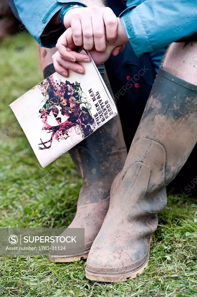 Muddy boots at Green Man Festival, Glanusk Park, Brecon Beacons, Wales, UK