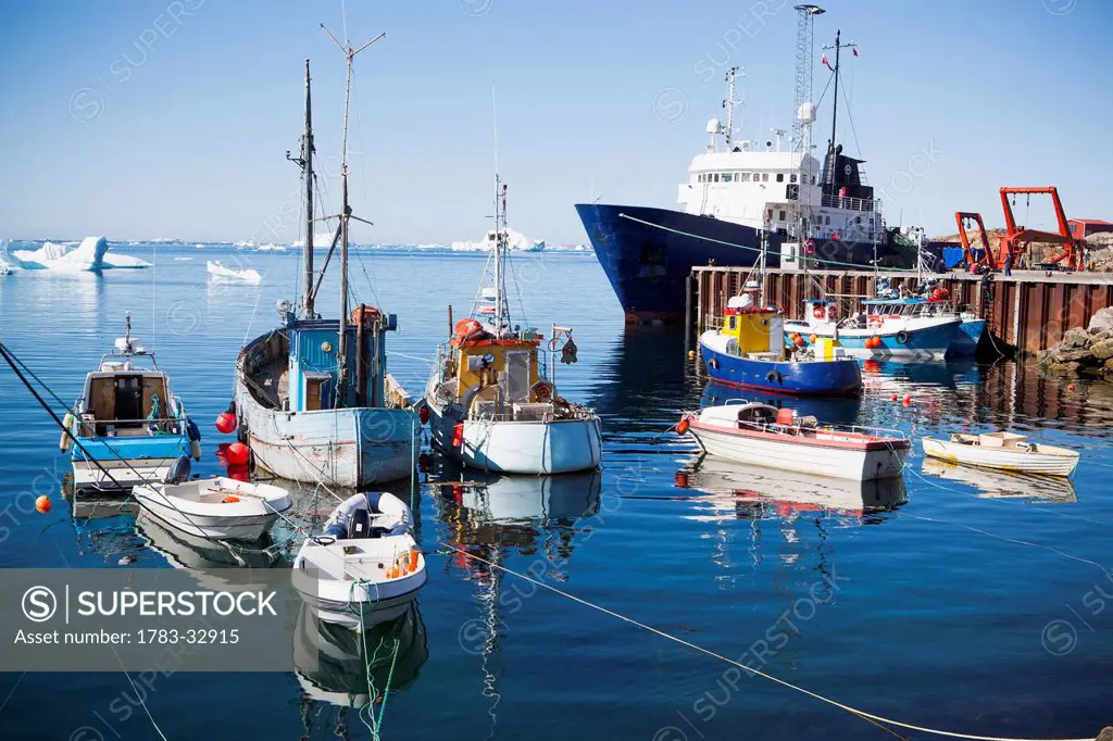 Denmark, Greenland, Boats in harbour; Upernarvik