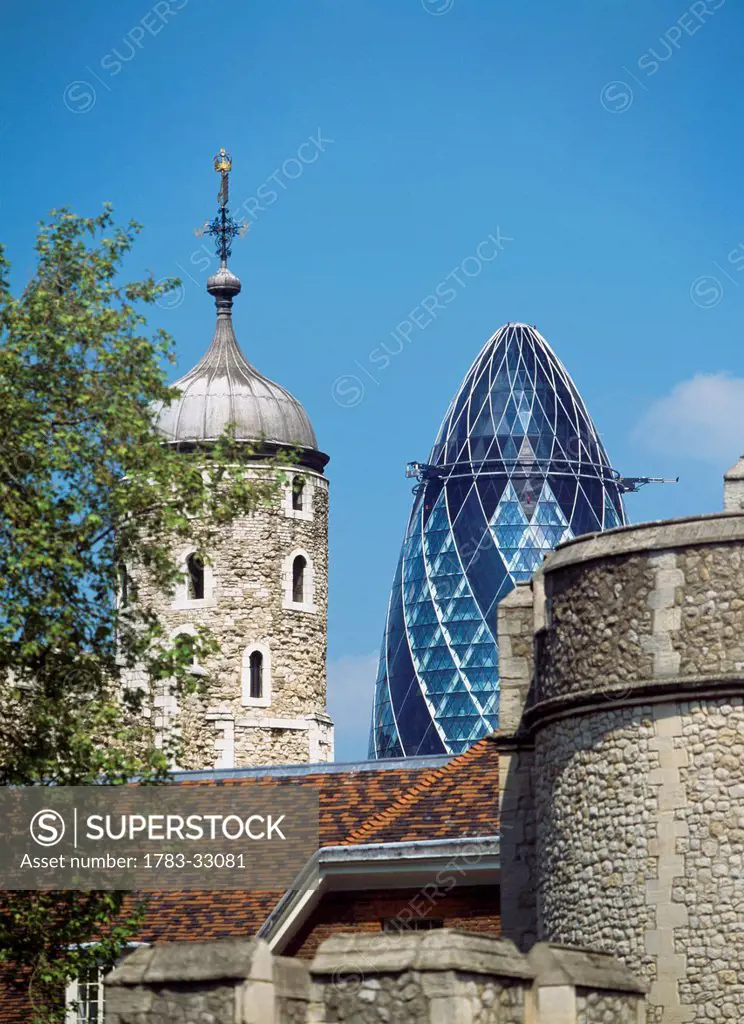 The Tower Of London With The Swiss Re Building Behind,London,Uk.