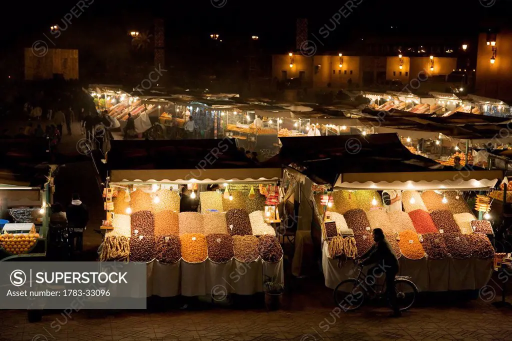 View Over Stalls Lit Up At Night In Djemaa El Fna, Marrakesh,Morocco