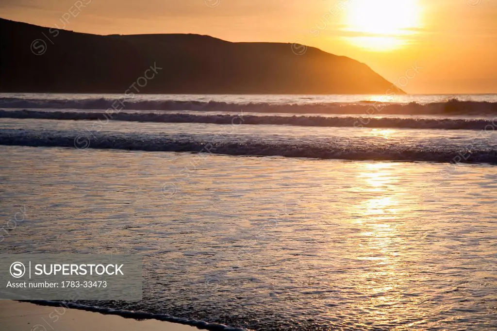 Sunset Over The Sea And Beach In Putsborough Sands, North Devon, Uk