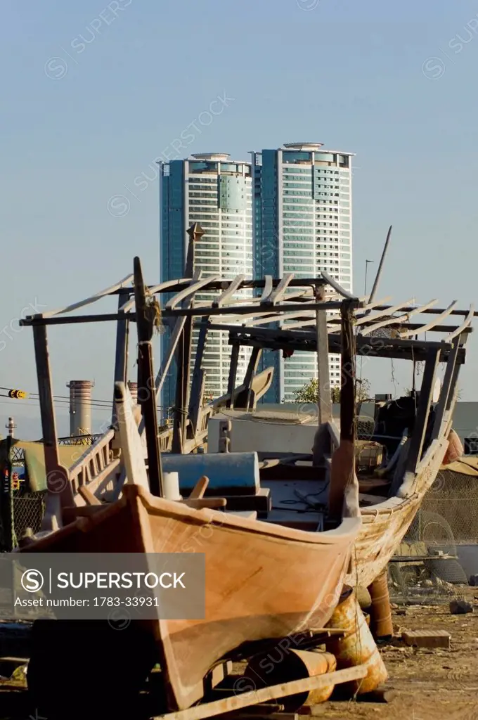 United Arab Emirates, View Of Old Dhow And Skyscraper In Background; Ras Al Khaimah