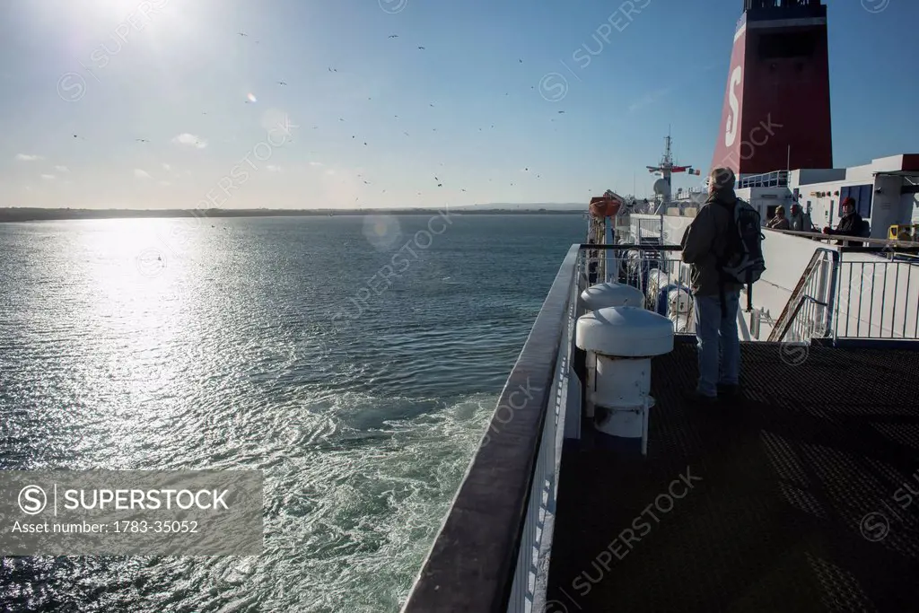 Uk, Ireland, Man On Board Of Ferry Boat; County Wexford