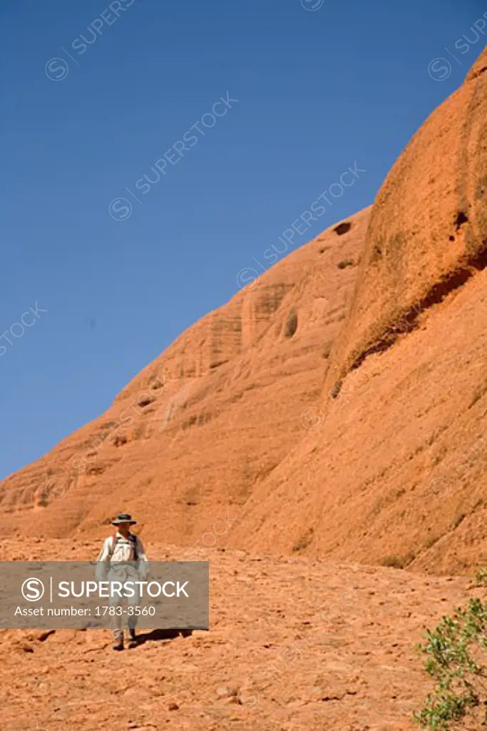 Man hiking at the Olgas, Kata Tjuta, Northern Territory, Australia