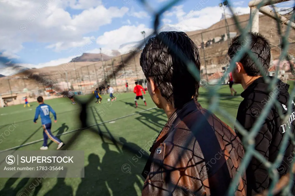 Boys Playing On The Football Pitch Close To The Iran Border In Iraqi Kurdistan, Iraq