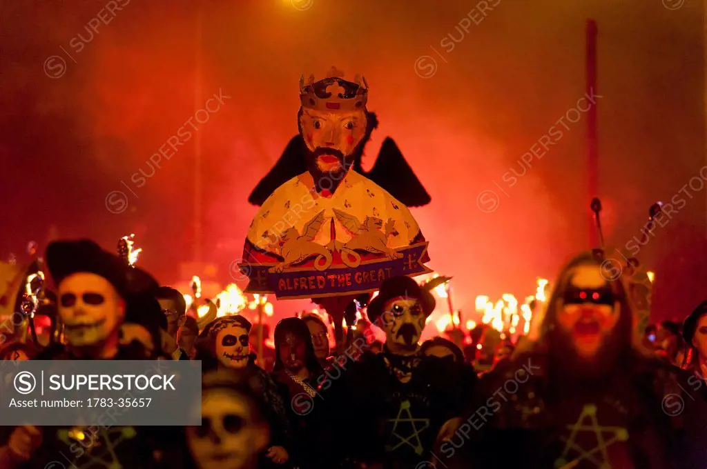 Bonfire Societies Marching Through The Streets Of Seaford With Effigy Of Alfred The Great, East Sussex, Uk