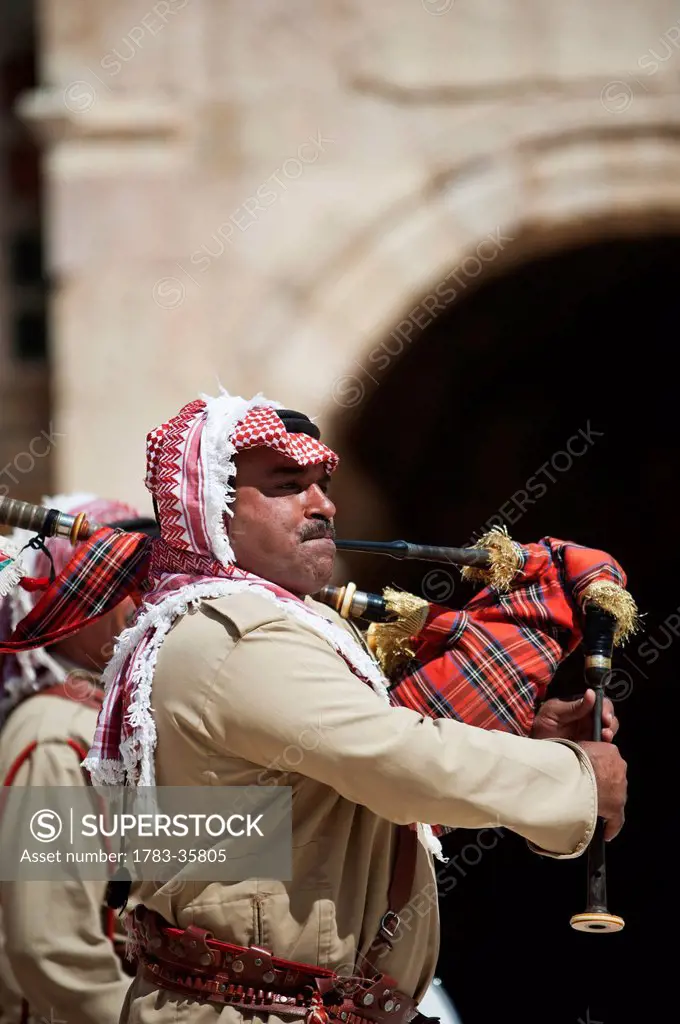 Bagpipe Player At The South Theatre In Gerasa, The Ancient City Of Jerash, Jordan, Middle East