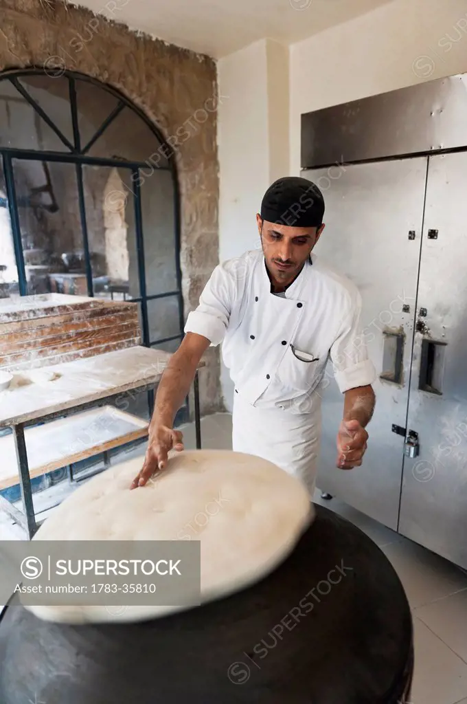 Bread Making At The Bakery At Haret Jdoudna, Madaba, Jordan, Middle East