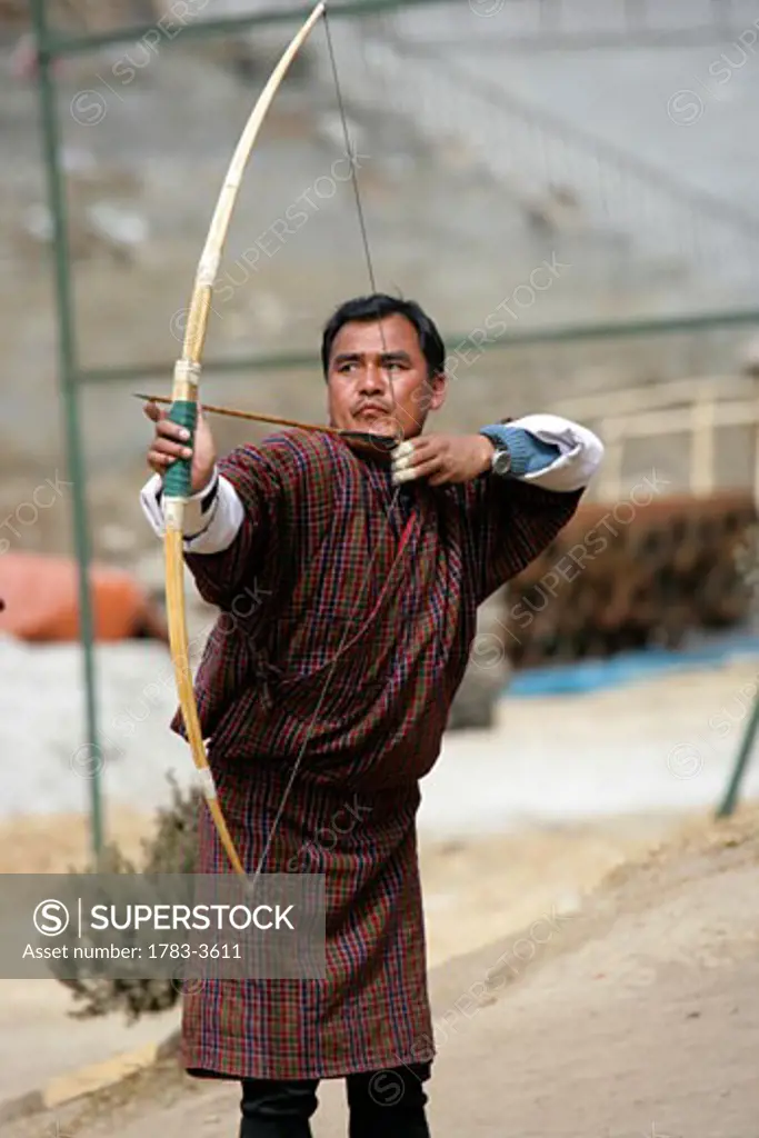 Man aiming with longbow, Thimphu, Bhutan