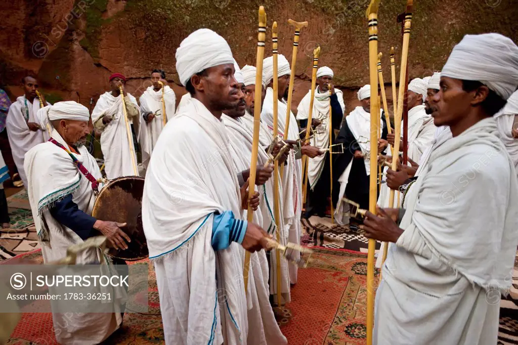 Ethiopia, Ethiopian Orthodox Deacons In The Courtyard Of ABet Emmanuel Rock Church; Lalibela