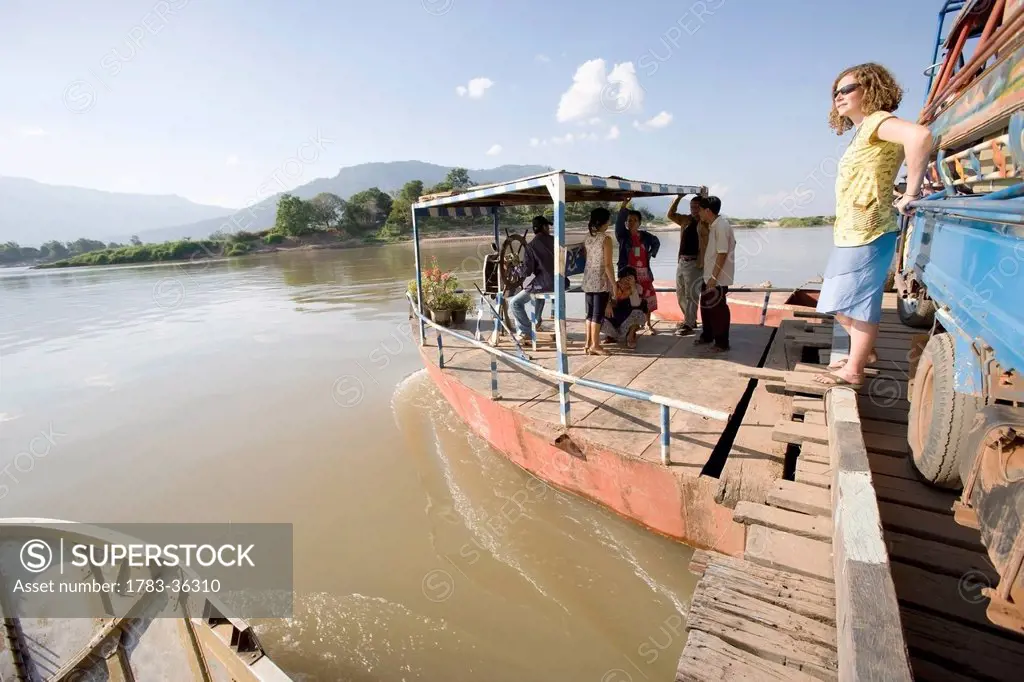 Locals And Tourist On Ferry On Mekong River, Champasak,Southern Laos