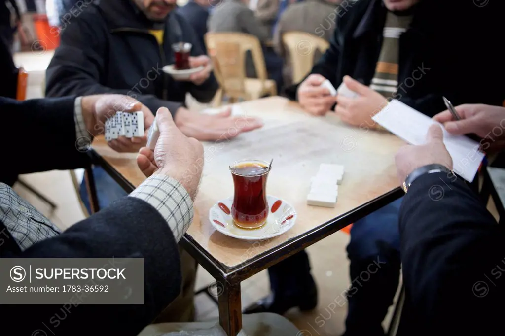Men Playing Dominoes Game In The Sha'ab Chai Khana Teahouse, Sulaymaniyah, Iraqi Kurdistan, Iraq
