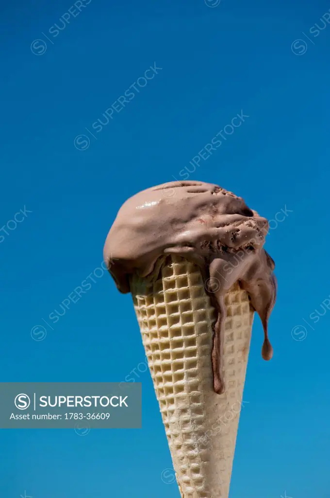 Melting Ice Cream Against A Blue Sky, West Sussex, Uk