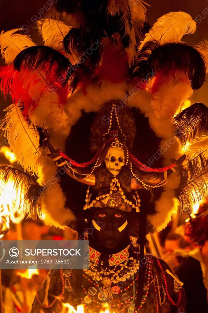 Man Dressed As Zulu Warrior In Procession At Barcombe Bonfire Night, Barcombe, East Sussex, Uk