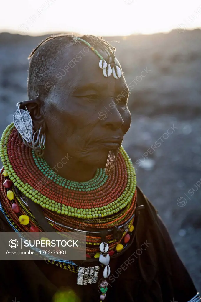 Kenya, Portrait of traditionally dressed Turkana woman; Loyangalani