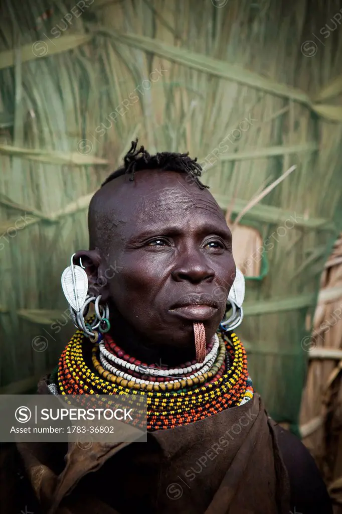 Kenya, Portrait of traditionally dressed Turkana woman; Loyangalani