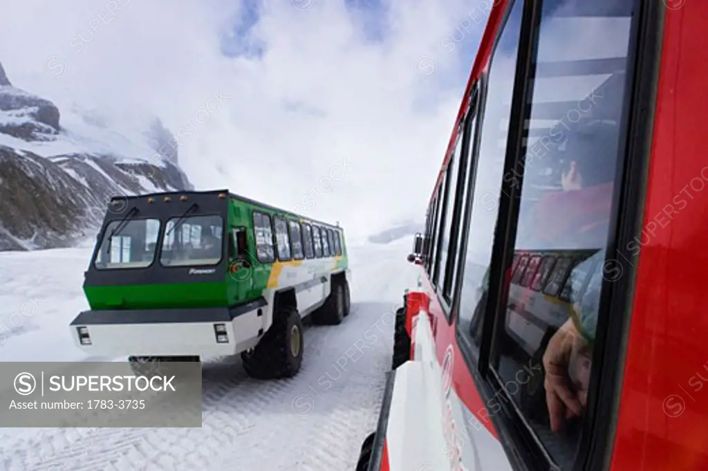 Special designed snowcoaches afford access to the Athabasca Glacier for tourists wishing to walk on the icefield , On the boundary of Banff and Jasper National Parks Alberta Canada 