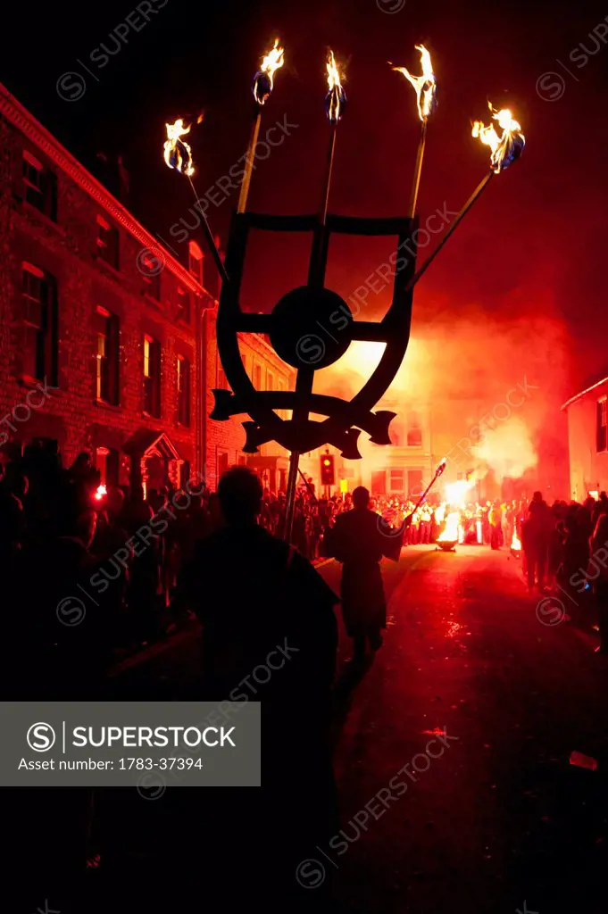 People dressed as monks from Southover Bonfire Society lead Grand Procession through streets of Lewes on Bonfire Night; Lewes, East Sussex, England, U...