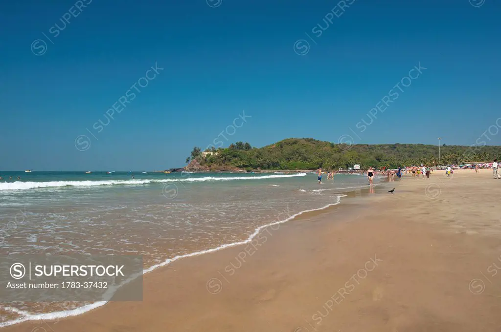 View of beach at sunny day; Baga, Goa, India