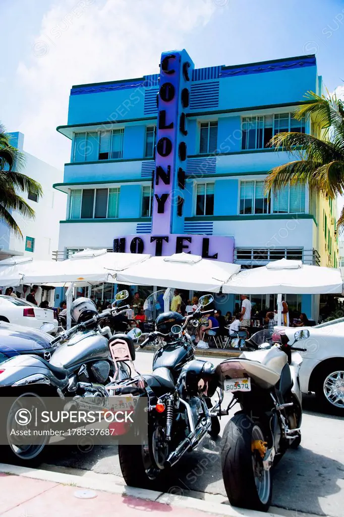 Group of motorbikes parked out the Colony Hotel; Ocean Drive, South Beach, Miami, Florida, USA