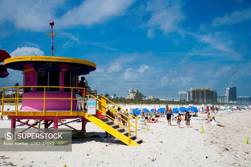 Brightly colored pink & yellow lifeguard tower; South Beach, Miami, Florida, USA