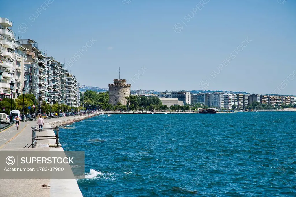 View of waterfront with The White Tower in background; Thessaloniki, Greece