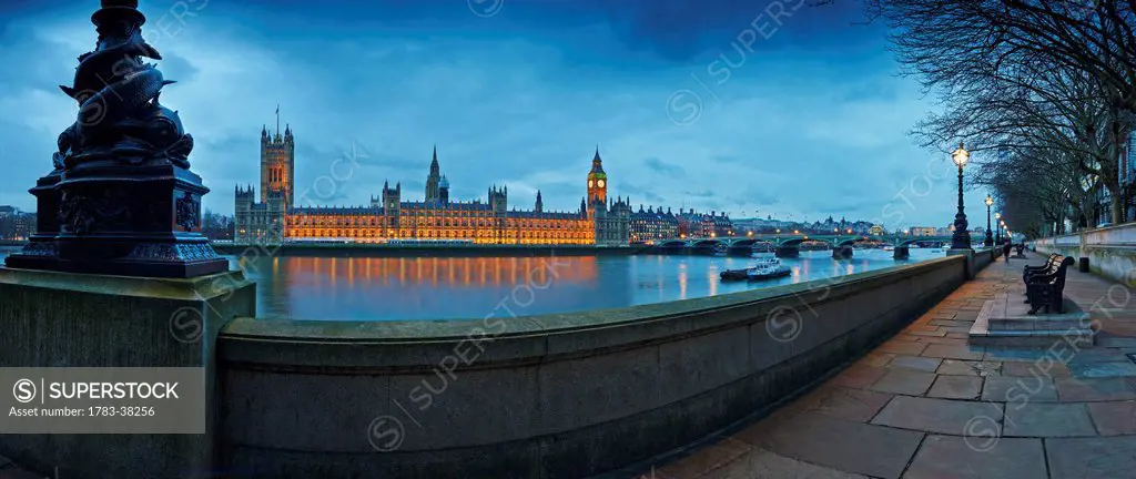 Panoramic view of Houses of Parliament at dusk from River Thames; London, UK