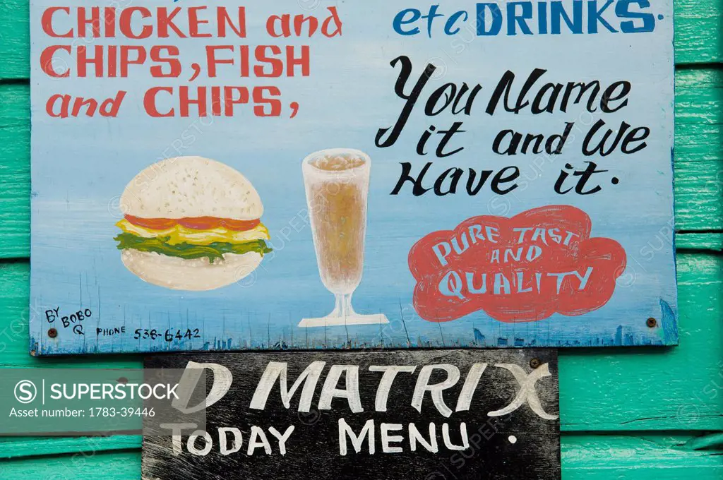 Hand painted bar and restaurant signs; Hillsborough, Carriacou Island, Grenadines, Grenada, Caribbean