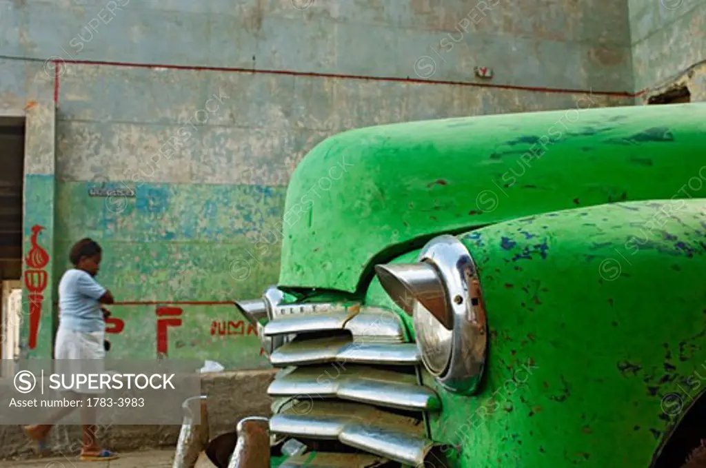 Dilapidated old green car, Havana, Cuba