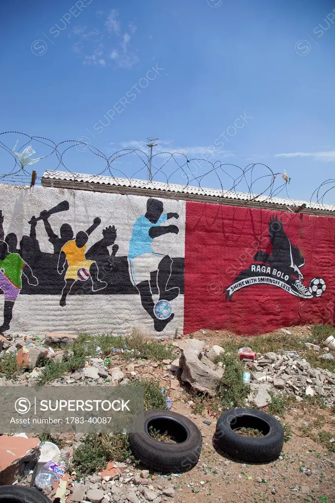 South Africa, Garden Route, Port Elizabeth, Football themed murals on walls; New Brighton