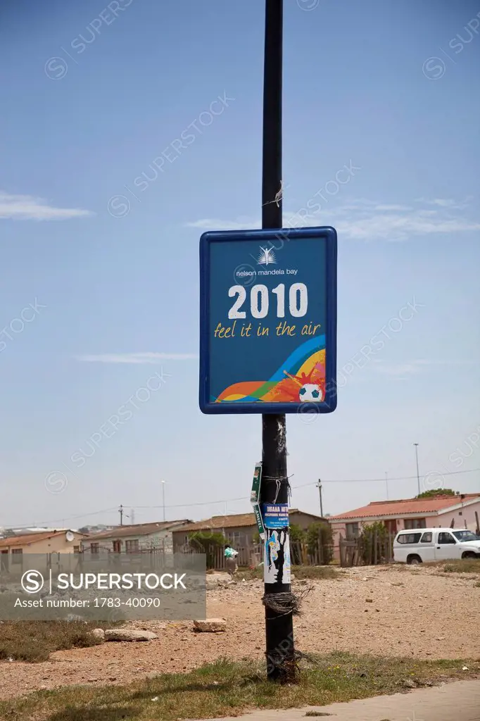 South Africa, Garden Route, Port Elizabeth, Football championship themed poster on street lamp; New Brighton