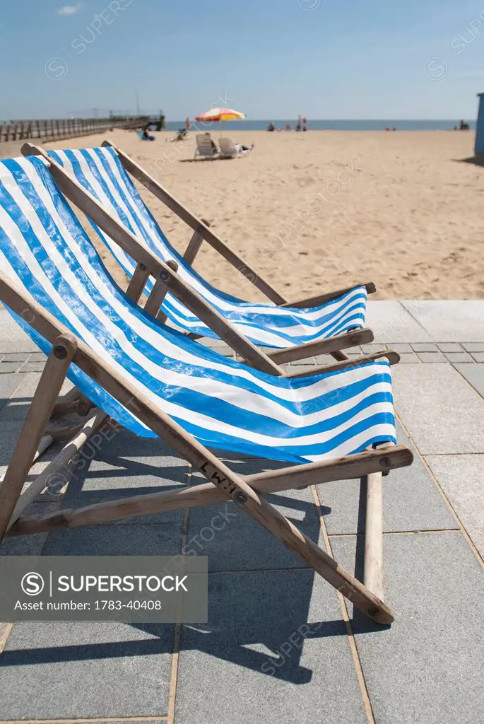 UK, England, Norfolk, Deckchairs on promenade; Great Yarmouth