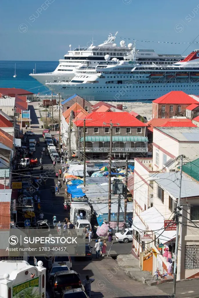 Looking down Market Street to saturday market with cruise ships in port behind, St Georges, Grenada. © Ian Cumming / Axiom