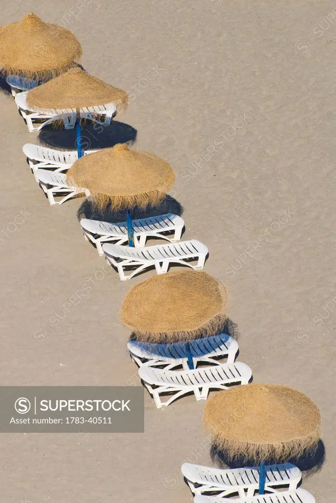 Rows Of Parasols On The Beach Of Torremolinos, Andalucia, Spain.