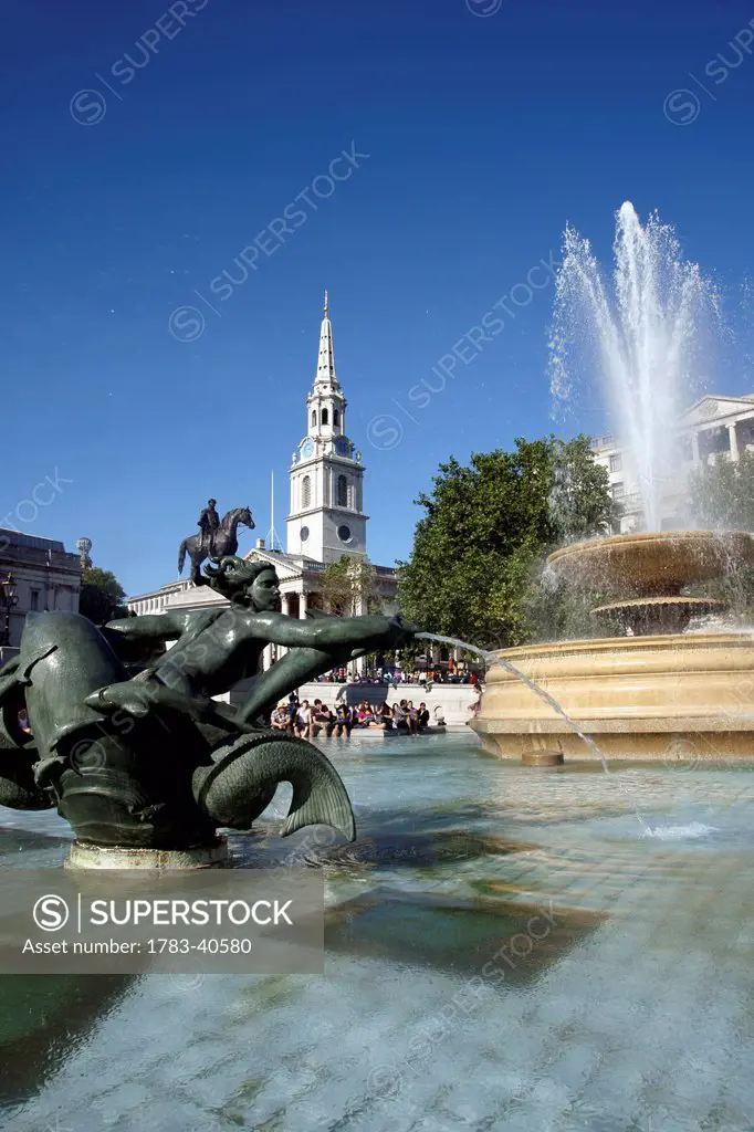 United Kingdom, England, Fountain and St Martin's Church on Trafalgar Square; London