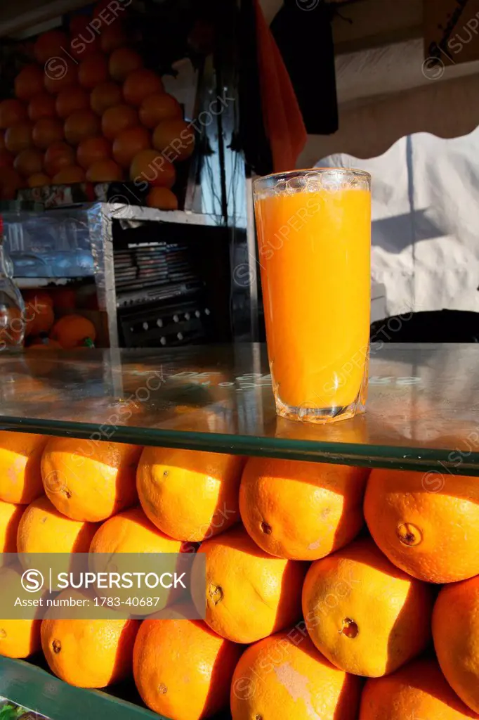 Morocco, Oranges and orange juice on portable stall; Marrakesh/Marrakech/